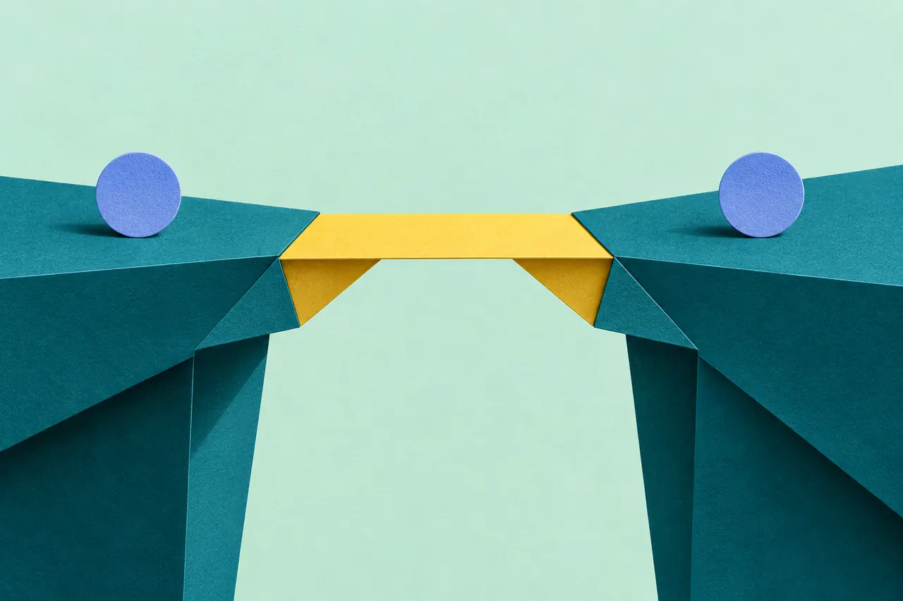 Two separate paper bridges meet as a yellow piece connects their ends